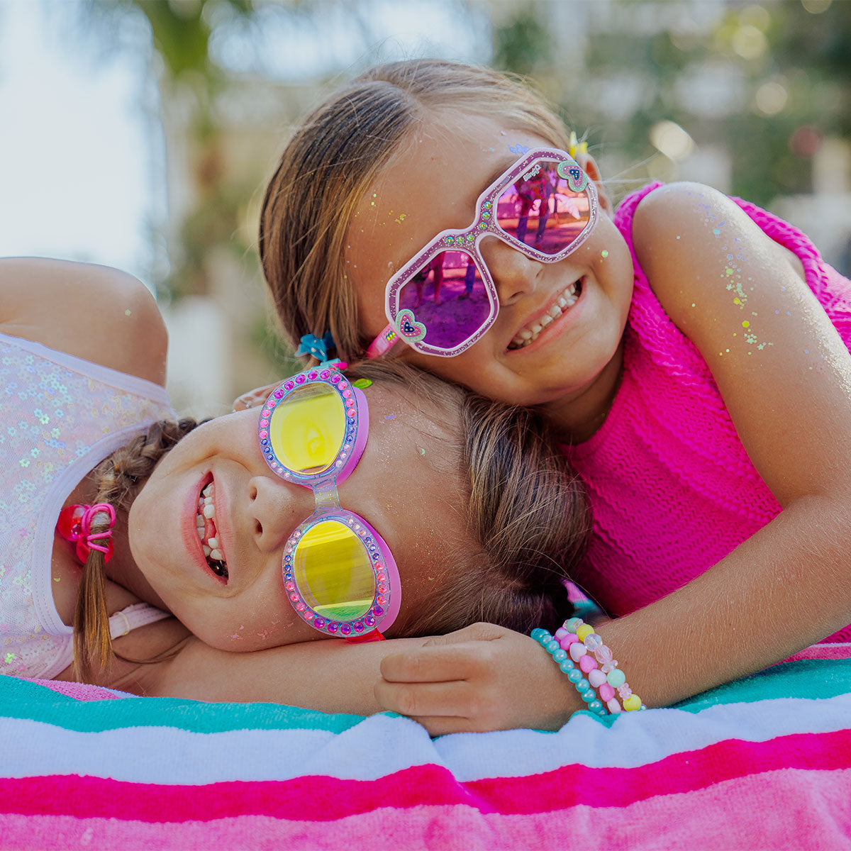 girls in malibu sunglasses and sparkle swim goggles feature image for new product section