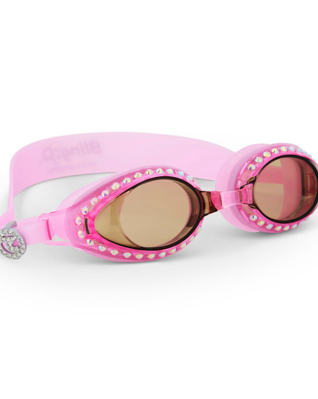 angled view of seek tranquility swim goggles in peaceful pink showing a dusty pink swim goggle with rhinestones