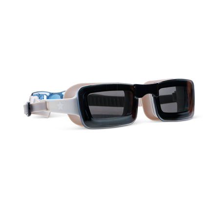 angled view of Velocity Swim Goggles in Onyx showing a sleek black frameless lens and tan colored  silicone gasket and strap