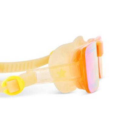 close-up view of Velocity Swim Goggles in Volt showing a sleek gold frameless lens and gold colored  silicone gasket and strap