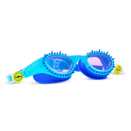 angled view of Jurassic Dive Kids Swim Goggles in seafoam spike showing silicone spikes, a reptilian printed frame and eyeball strap sliders