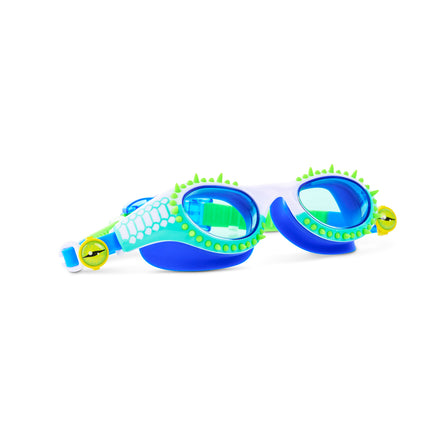 angled view of Jurassic Dive Kids Swim Goggles in seafoam spike showing silicone spikes, a reptilian printed frame and eyeball strap sliders