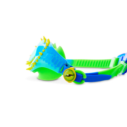close-up of Jurassic Dive Kids Swim Goggles in stego splash showing silicone spikes, a reptilian printed frame and eyeball strap sliders