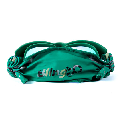 back shot of Softline Swim Goggles in meadow showing soft strap