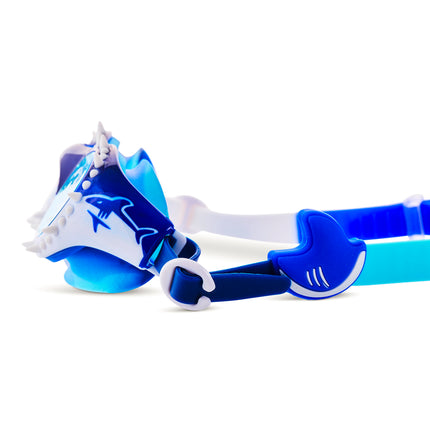 close-up view of Shark Surge Kids Swim Goggles in great white strike showing silicone spikes, shark fin slider and a shark illustration on the frame