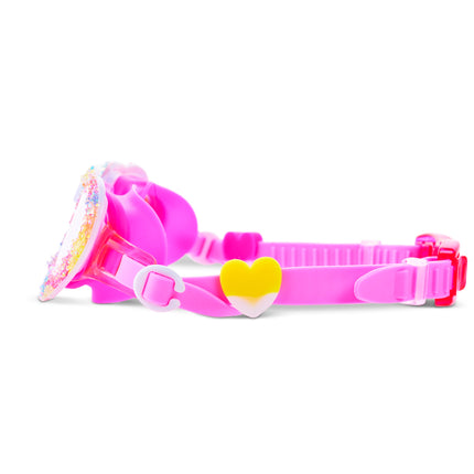 close-up of Crystal Crush Kids Swim Goggles in sugar kiss showing our "When 2 hearts meet" silicone sliders and strap
