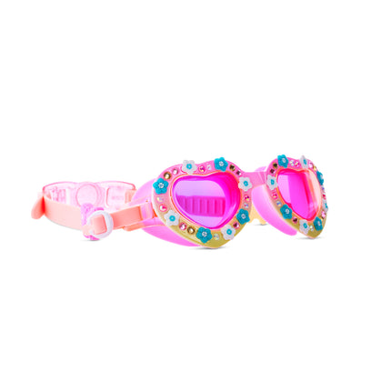 angled view of Daisies at Dawn kids swim goggles in sunkissed petals showing flower charms and rhinestones