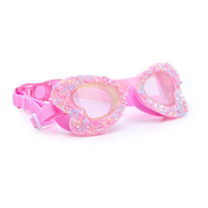 angle view of butterfly shaped kids swim goggles in blush butterfly showing crushed rhinestones on the frame