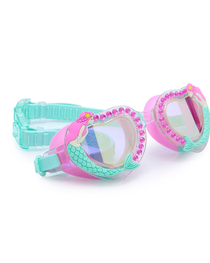 angled view of mystical mermaid kids' swim goggles in mermaids kiss showing a glitter infused frame, rhinestones and 3d mermaid detail