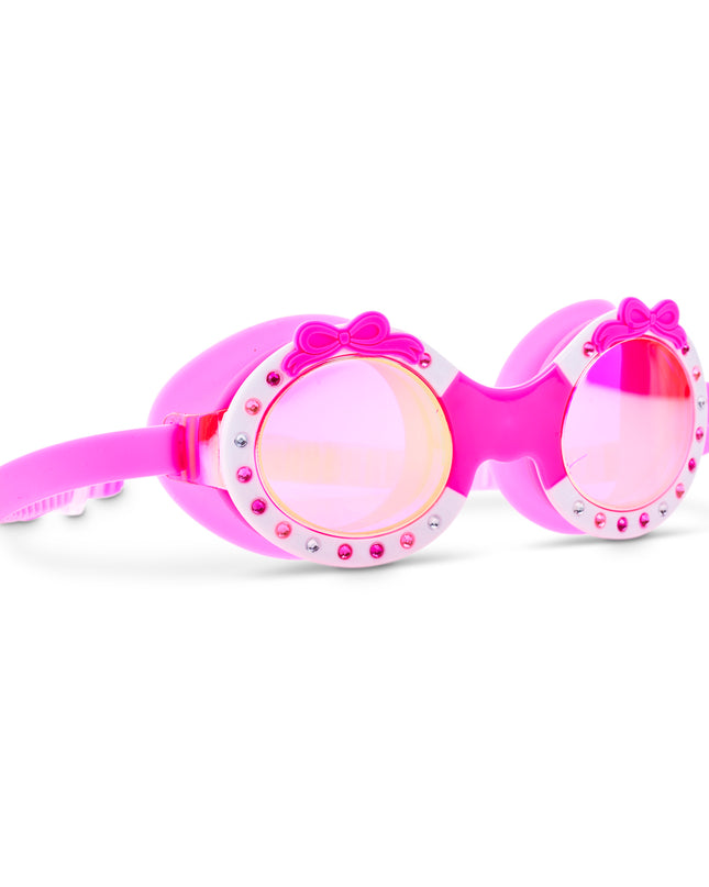 Angled view of Ribbon Glam Bow Dazzle Pink swim goggles with rhinestone frame