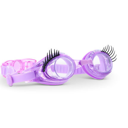 angled view of splash lash kids' swim goggles in purple polish showing faux lashes and rhinestones