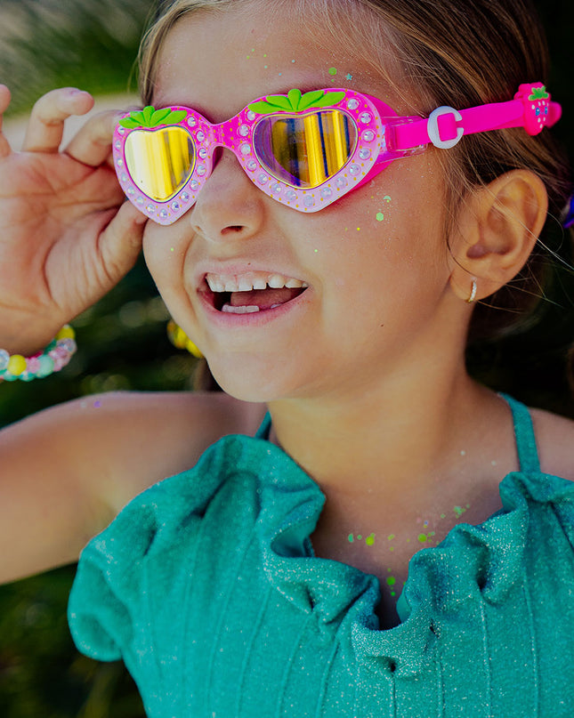 strawberry splash swim goggles in berry pink as seen on news12