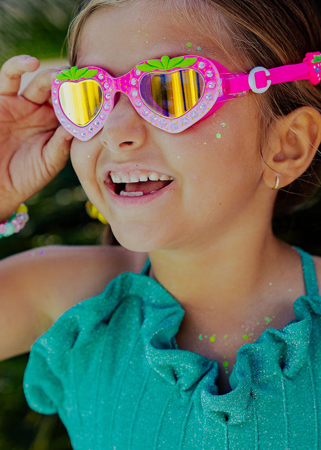 strawberry splash swim goggles in berry pink as seen on news12