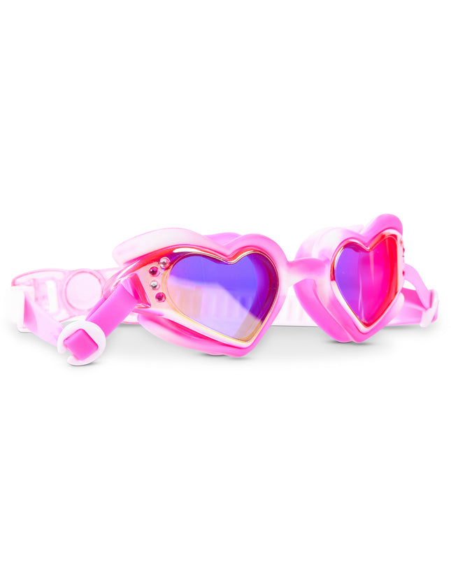 Angled view of Swirl Me Up Pink Drink swim goggles featuring glossy pink frame and mirrored heart lenses