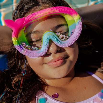 mermaid's cove kids swim mask in splash n shimmer lifestyle image girl relaxing wearing swim mask