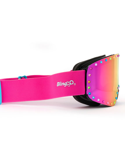 side product image of powder pop ski goggles in alpen glow showing a ink mirrored lens with rainbow rhinestones and a hot pink strap