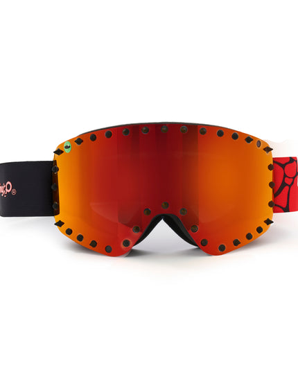 front angle of prism peak kids' ski goggles featuring a red orange mirrored lens with black spikes and a monster eye decal with a black strap and red buckle