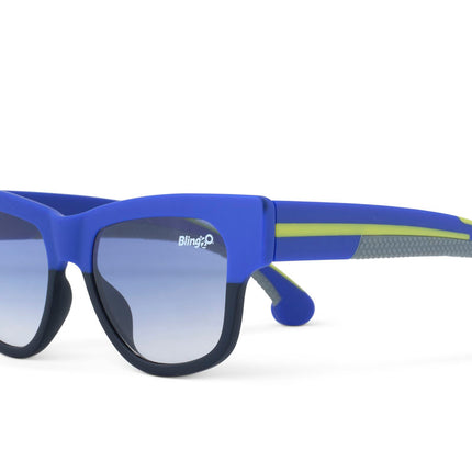 angled view fire island kids' sunglasses in royal sun rays showing wayfarer shaped sunglass frame in a royal blue and black colorway