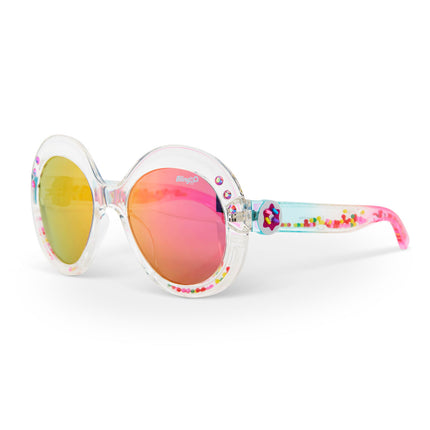 angled view of glass beach kids sunglasses in sprinkle sunrise showing reflective lens, clear large round frame with 3D gumballs in the arm of the sunglass