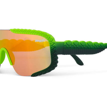 side view of gulf shore kids' sunglasses in gator glare green showing gator textured arms and frame