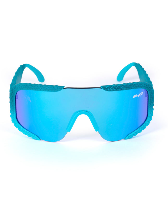 product shot of gulf shore kids' sunglasses in siesta sea featuring a vibrant blue color and crocodile-inspired texture and shield lens
