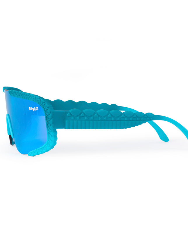 side product shot of gulf shore kids' sunglasses in siesta sea featuring a vibrant blue color and crocodile-inspired texture