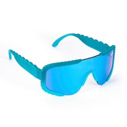 product shot of gulf shore kids' sunglasses in siesta sea featuring a vibrant blue color and crocodile-inspired texture