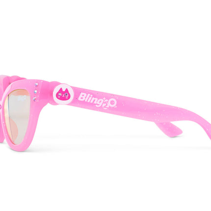 side view of malibu beach kid's sunglasses in pisces pink to camera showing pink glitter frame and pink rhinestone detail