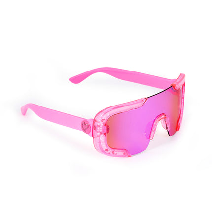 angled product shot of pink sand kids' sunglasses in color sprinkle pink featuring shield frame with 3-d sprinkles in the frame, heart insignia and all pink frame and lens