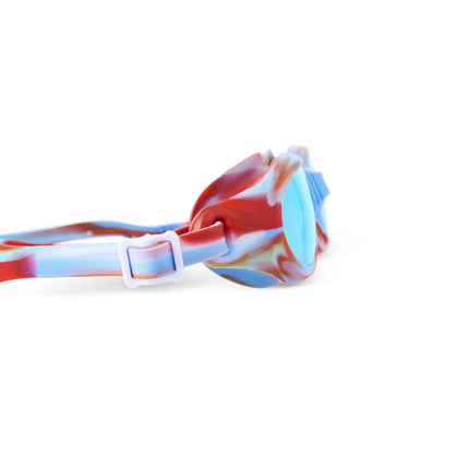 side view of salt water taffy kids' swim goggles in freedom swirl showing all silicone frame with swirls of red, white and blue and reflective lens