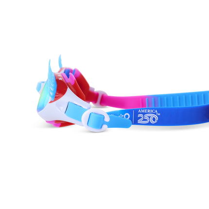 side view of splash lash kids' swim goggles in blue lashes & 4th bashes showing blue eyelashes and america250 logo