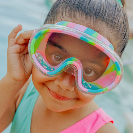 lifestyle of girl wearing crystal current in sapphire swirl showing turquoise glitter settled at the bottom of the frame