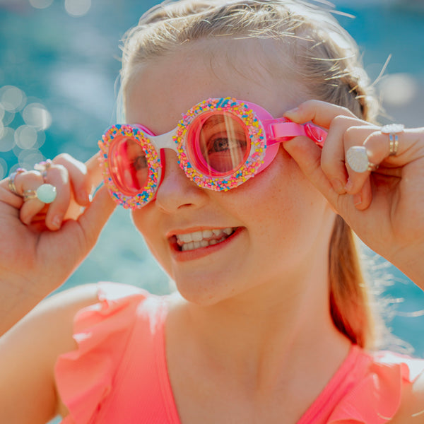 pink goggles Bling2o Do Nuts Swim Goggles