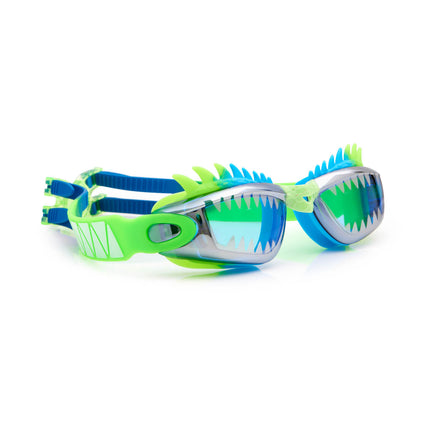 angled view of draco the dragon kids' swim goggles in sea dragon green showing silicone spiked gasket and sharp teeth printed lens