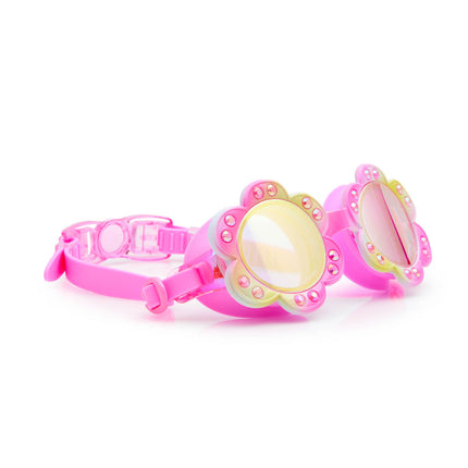 angled view of gardenia flower shaped swim goggles in golden hour showing petal details and rhinestones with mirrored lens