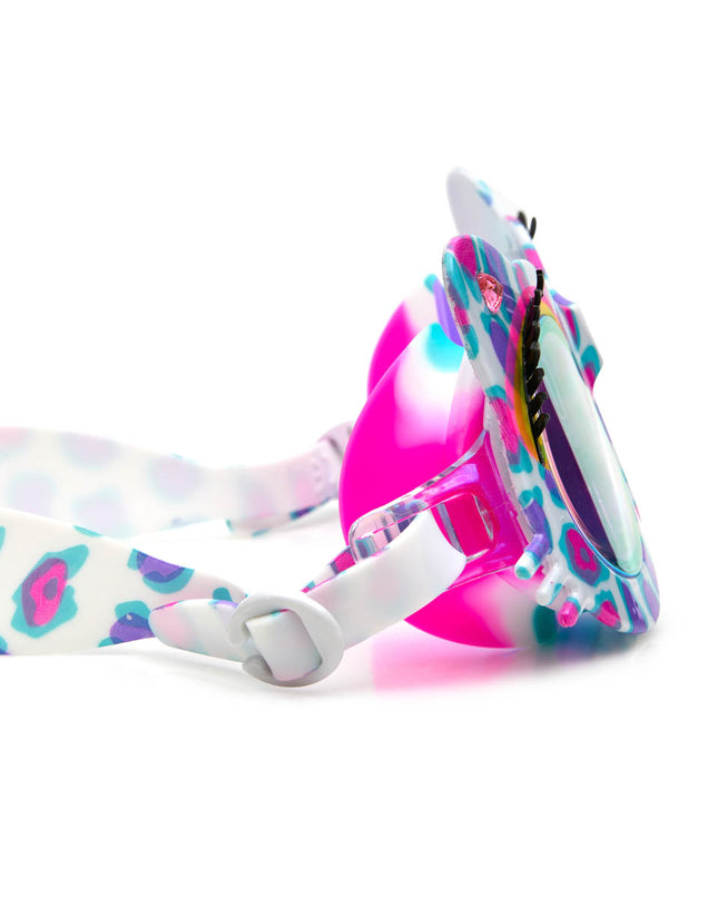 close-up view of savvy cat kids' cat-shaped swim goggles in purple patches showing bright cheetah print pattern, faux eyelashes and rhinestones