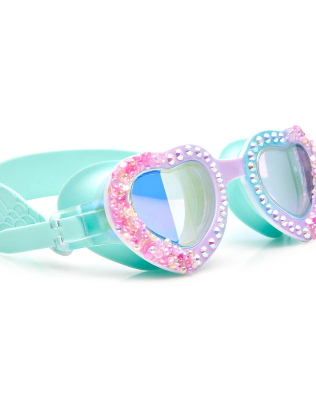 angled view of seaquin kids' heart shaped swim goggles in bluetiful showing details of crushed pink rhinestones and a set of rhinestones 